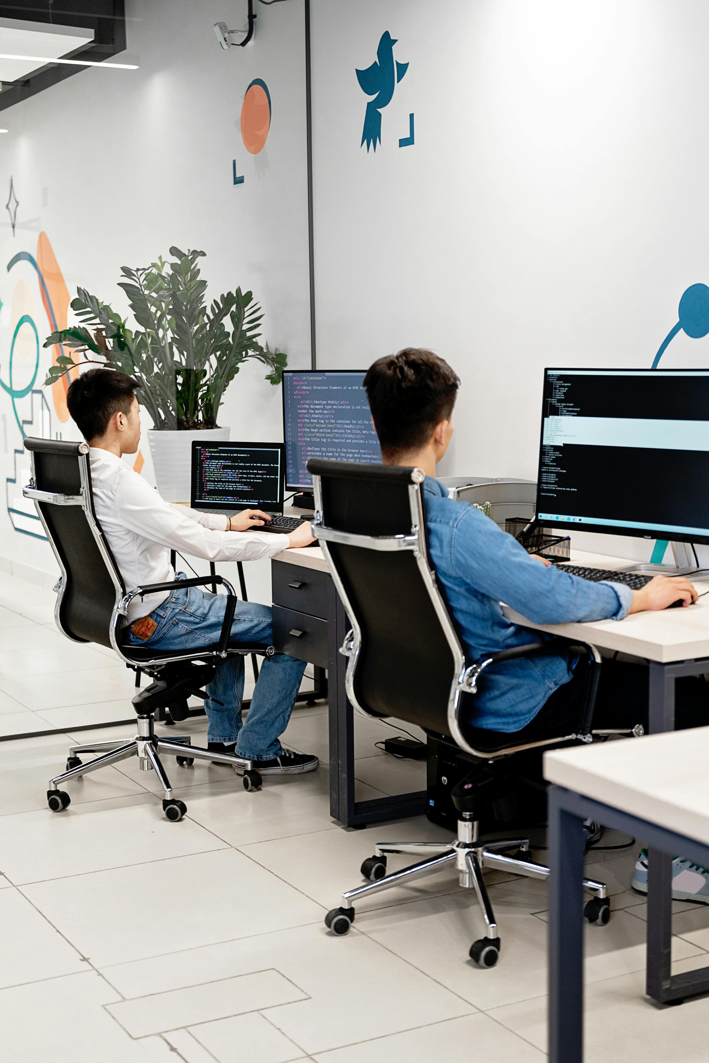 Engineers reviewing code together — managed squad means the "how" comes bundled with the "who"
